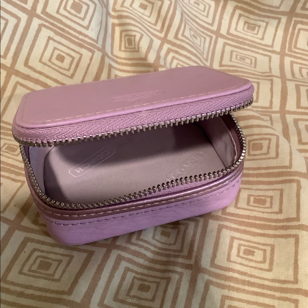 Coach pill/lipstick purse. Mauve
